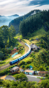 Railway On Mountain Near Houses