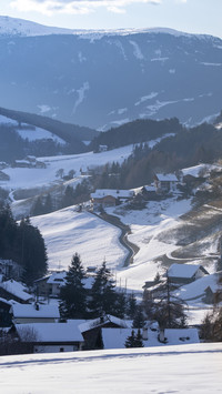 The morning light first shines on the snow town