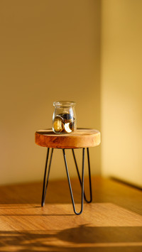 Top view of jar bank with money coins