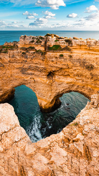 Heart-shaped cliffs on the shore of Atlantic ocean