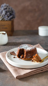 Chocolate lava cake on dark background