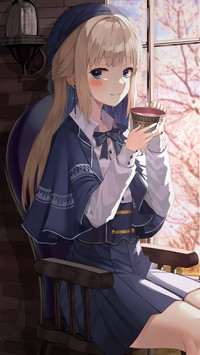 The girl drinking coffee at the window