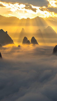 The sea of clouds in guilin basks in the morning light