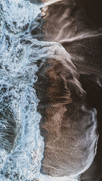 Experience the fantasy of the black sand beach 2