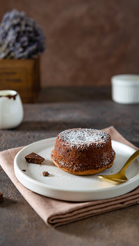Delicious french fondant with hot chocolate centre on plate
