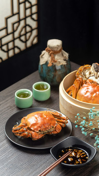 Why is the price of hairy crabs halved