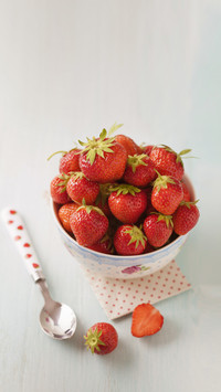 Bowl of strawberries close up