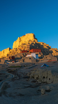 The Golden Sun Shines on The Top of The Mountain