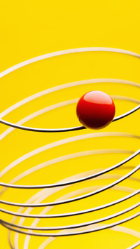 A red sphere with a yellow background