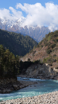 Snowcapped mountains forests and rivers