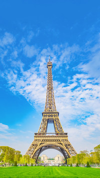 Eiffel Tower in Cloudy Beautiful Sky Day Paris, France