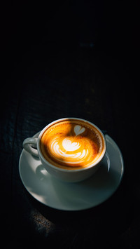 Vintage style closeup latte large cup with bokeh in cafe