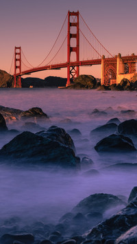 The golden gate bridge spans the bay