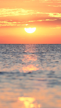 Seascape under the orange sky