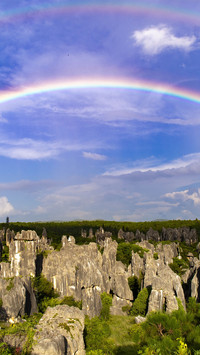The rainbow on the stone peak