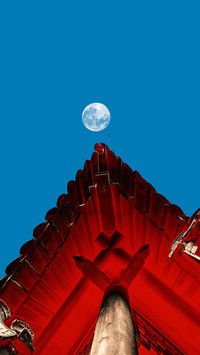 The wooden eaves collect the starry river of all