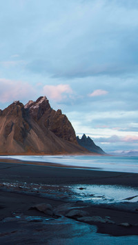 Beautiful sunset black sand beach in Iceland