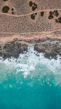 Bondi Cliff Waves Crashing on the Shore