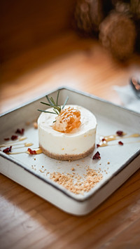 Homemade cheesecake on wood background