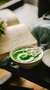 A Small Bowl of Green Juice for Making Green Balls