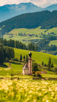 Landscape of the Dolomite Alps and St Johann Church