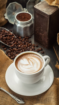 Coffee cup, coffee beans with bag
