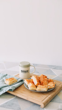 Breakfast with puff buns and a glass of milk