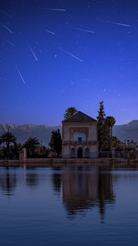 Meteor Shower over Wooden House