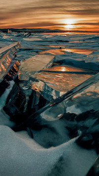Evening glow on frozen lake