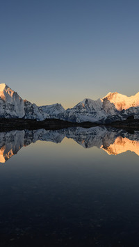 Sunrise reflection on the east slope of Mount Qomolangma