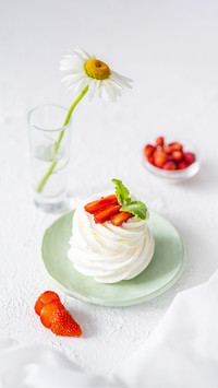 Appetizing Cream Meringue Cake in a Breakfast Plate