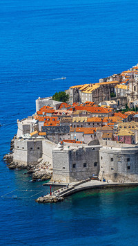 Red tiles and white rocks hide a thousand years of
