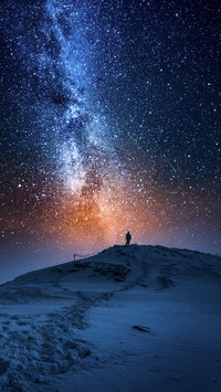 The eye of the galaxy hangs in the night sky