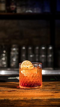 Fresh frozen summer cocktail dark bar