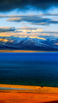 Snow Mountain Sunrise at Namtso Lake in Tibet