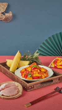 A plate of pineapple and sweet meat