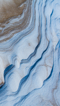 Beautiful patterns of snow and yellow sand