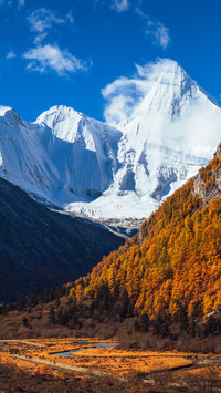 The sacred mountain of yangmaiyong stands still among the