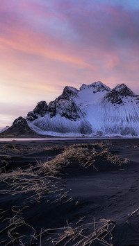 Soft sunset in the fantastic mountain of Stokksnes