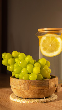 Green Grapes lie on eco dish