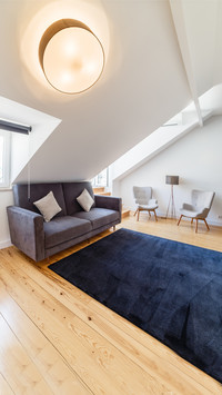 The living room is rich in elements without clutter 89
