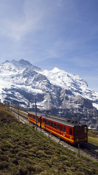 Mountain railway jungfraubahn leaving kleine scheidegg