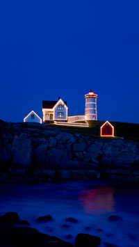 Twilight shot of Christmas in July at Cape Neddick, Maine