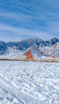 Snowy offroad trail in the qilian mountains