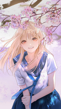 Blonde Girl Smiling Under Flowers