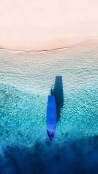 Boat near the beach. Seascape from drone
