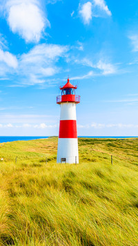 Ellenbogen lighthouse on coast of Sylt island, Germany