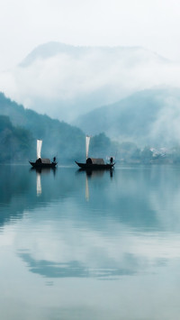 The misty and rainy oujiang river is depicted in a