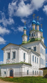 White Church with Blue-Green Domes, A Scene of Serenity