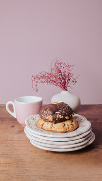 Table set with cookies and cup of coffee